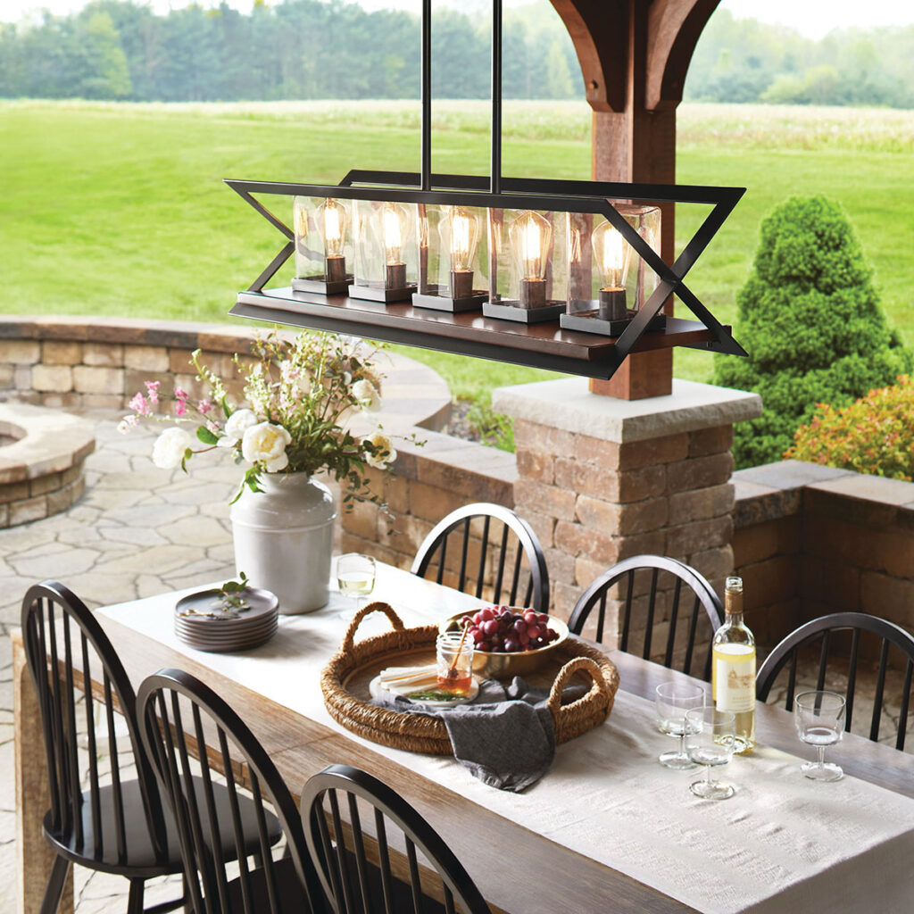 Outdoor pendant light fixture above table